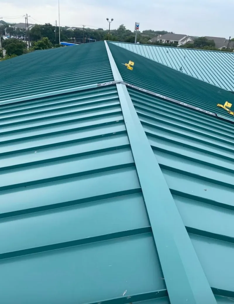 Green commercial metal roof ridge and valley for Metal Roof Repair in Lafayette